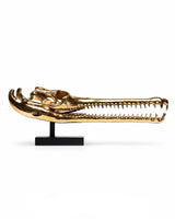 Gangesgavial-Schädel aus Bronze auf schwarzem Sockel, Seitenansicht mit langer Schnauze